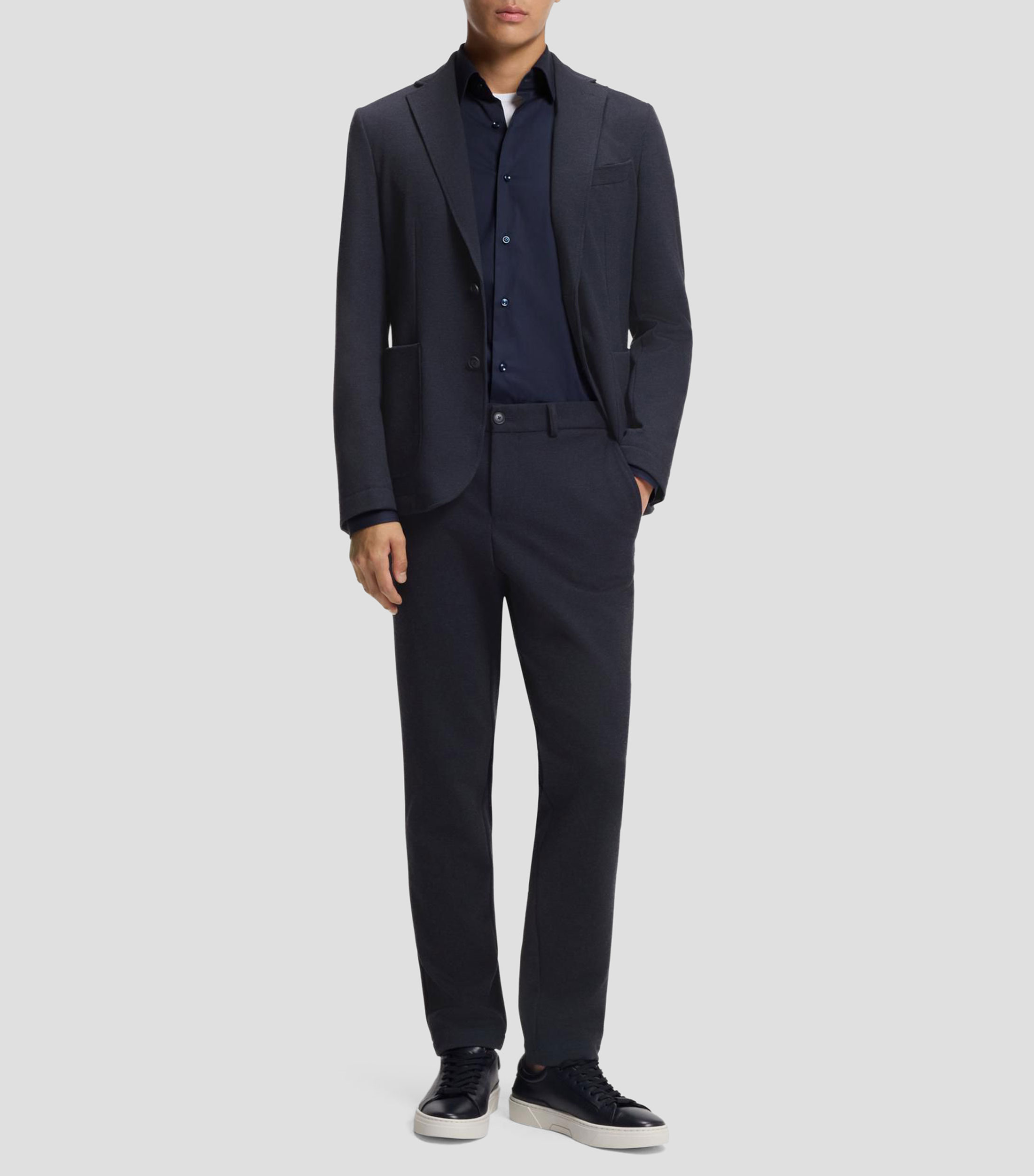 Pantalones slim fit de tejido elástico técnico Hombre